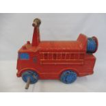A municipal use cast aluminium junvenile ride in the form of a fire engine, by Wicksteed Leisure.