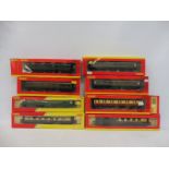 Four boxed Pullman Coaches and four Sarumsell First Class Coaches.