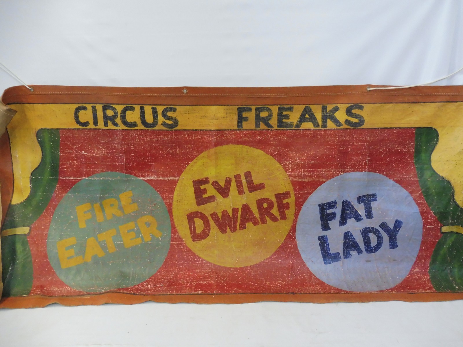 A large scale original artwork fairground banner on canvas, worded 'Circus Freaks', 75 x 32".