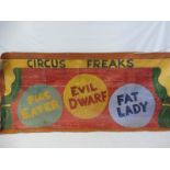 A large scale original artwork fairground banner on canvas, worded 'Circus Freaks', 75 x 32".