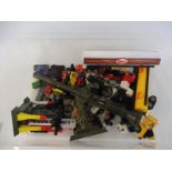 A selection of assorted die-cast in playworn condition and a plastic rocket launcher.