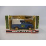 A boxed Britains no. 9571 Farm Land Rover, box and model appears excellent.