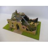 A well painted diorama British Commandos WWII bomb-damaged buildings.