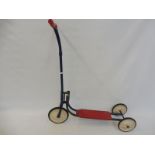 A childs Tri-ang scooter.