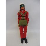 An original 1970s blue pants Action Man figure, with blond flock hair, complete with red devils
