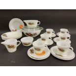 An original Pyrex dinner and tea set comprising a lidded tureen, six bowls, a gravy boat, six cups