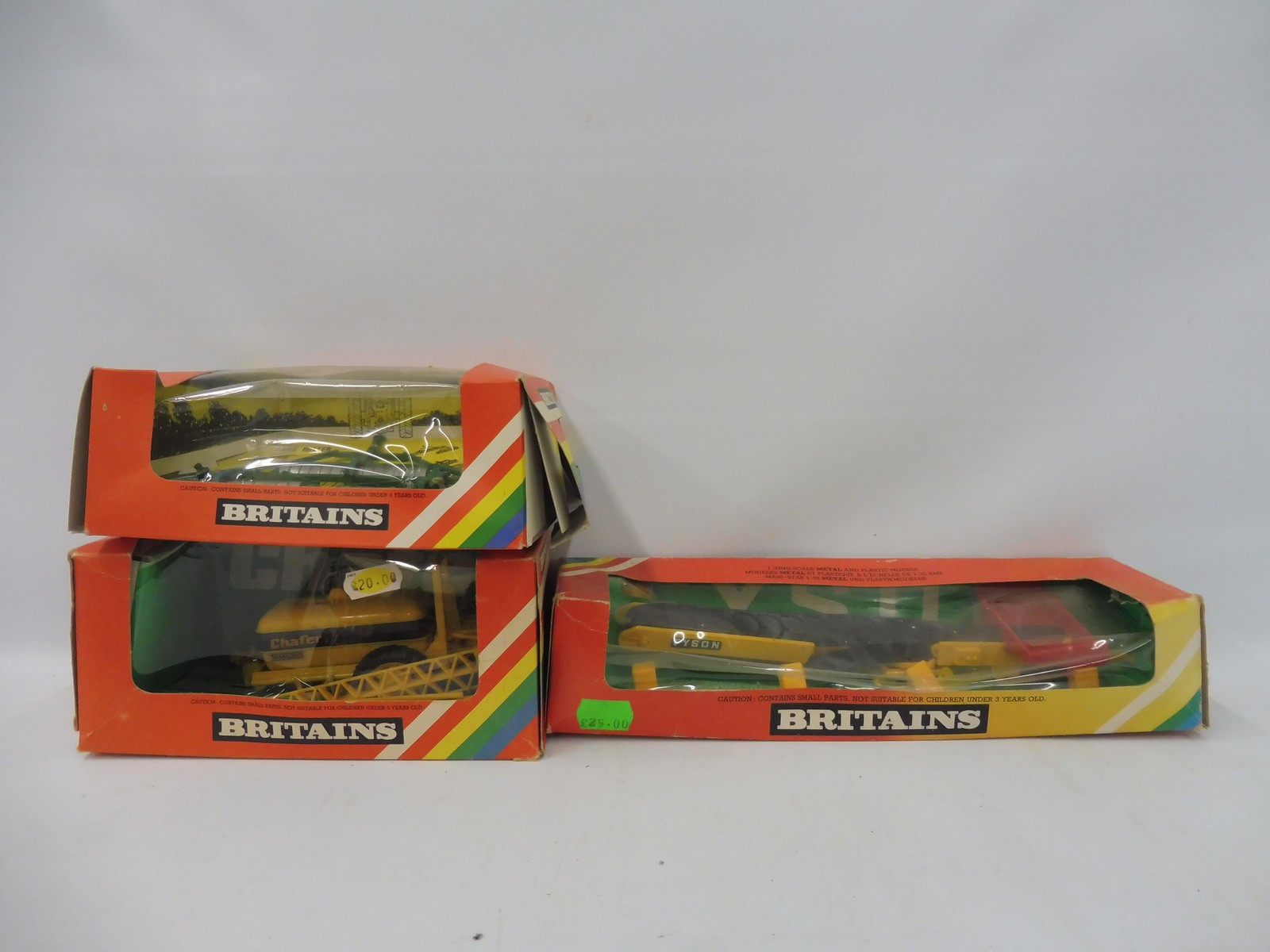Three boxed Britains Farm Implements and Accessories - no. 9579 Elevator, 9507 Sprayer and a 9554