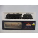 A boxed OO gauge Bachmann Royal Horse Guardsman, in weathered condition, untested.