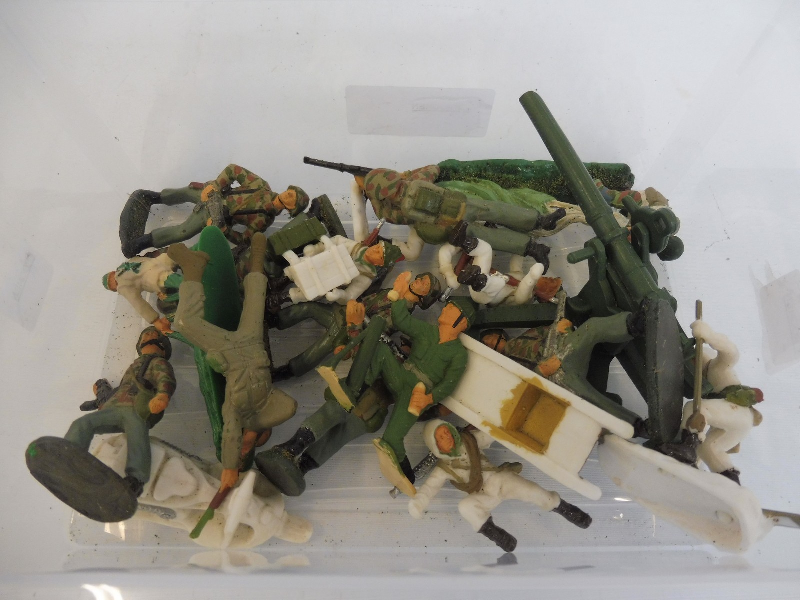 A small box of painted larger scale military figures to include Alpine troops.