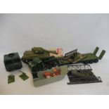A box full of large scale painted military vehicles.