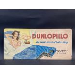 A Dunlopillo mattresses pictorial celluloid showcard, dated 1950, 24 x 11".