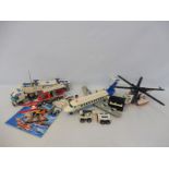 A box of Lego City to include helicopters and airliners etc. (unchecked).