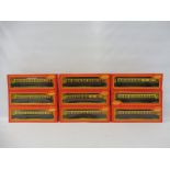 Nine boxed Tri-ang Hornby coaches in GWR livery.