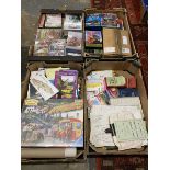 Four boxes of assorted transport related collectables including bus related videos, ephemera etc.