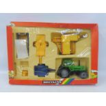 A circa 1987 Britains Rainbow Pack Deutz Tractor and Implements.