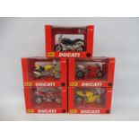 Five Maisto Ducatti motorcycles 1/18 scale, boxed.