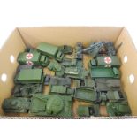 23 unboxed Dinky military vehicles.