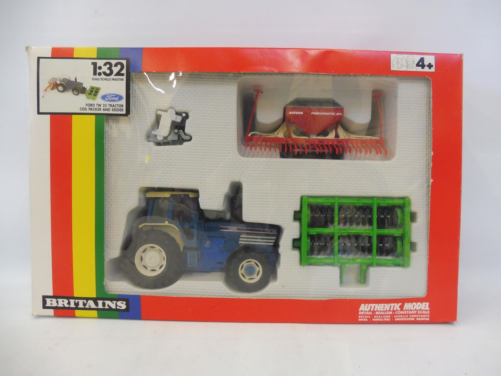 A boxed Britains: no. 9641 Ford TW25 tractor, coil packer and seeder, circa 1989 Rainbow pack, box