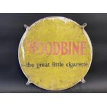 A pair of Woodbine cigarettes circular tin advertising signs, mounted back to back, 17 1/2"