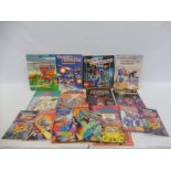 A quantity of original Transformers story books and colouring books etc.