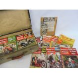A suitcase of assorted motorcycle magazines, from the 1960s.
