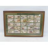 A framed and glazed set of 25 Stephen Mitchell & Son cigarette cards 'Angling', 18 1/4 x 12".