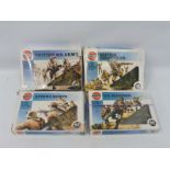 Four Airfix 1/72 scale circa 1980s British Paratroopers, Afrika Korps, US Marines etc.