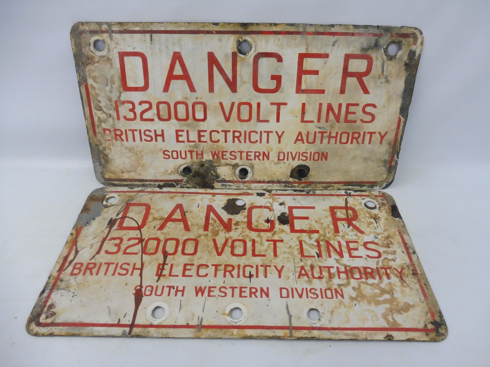 Two Danger 132,000 Volt British Electric South Division enamel signs, each 24 x 12".