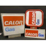 Two Calor Gas illuminated lightboxes, the largest 19 3/4" w x 22" h x 7 1/2" d, plus a double