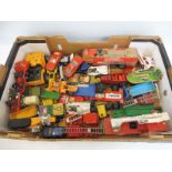 A large quantity of mainly larger scale playworn Dinky, Corgi etc.