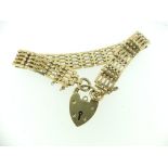 A 9ct yellow gold gate link Bracelet, together with 9ct gold padlock clasp, approx total weight