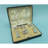 A George V silver six piece cased Cruet Set, by Mappin & Webb, hallmarked Birmingham, 1932, the