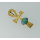 An 18ct yellow gold Ankh Brooch, set with a turquoise faience scarab, unmarked but tested as 18ct,