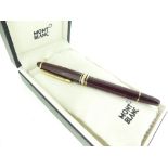 A Montblanc Meisterstuck No.146 Fountain Pen, the burgundy body with white Montblanc emblem and