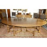 An impressive 17thC style oak oval gate-leg Dining Table, by Bryn Hall Bespoke Furniture with shaped