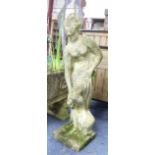 A reconstituted stone Garden Female Figure, of classical design, 35in (89cm) high.