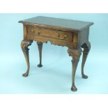 A 17thC style oak Low Boy, by Bryn Hall Furniture, with single cock-beaded drawer above shaped