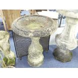 A Haddonstone 'Georgian' Birdbath, of classical baluster design embossed in high relief with