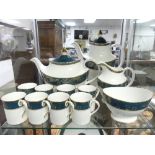 A Royal Doulton 'Carlyle' pattern Dinner Service: including eight place settings, serving