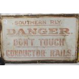Railwayana; A Southern Railways metal Sign, 'DANGER DON'T TOUCH CONDUCTOR RAILS' in red lettering on
