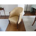 A French Louis XVI - style upholstered Tub Chair, with finely carved rosewood show-frame.