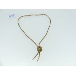 A 9ct yellow gold Necklace, formed of a double snakelink chain terminating in a knot front with