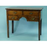 A 19th century oak Lowboy, the rectangular top with rounded angles, above two drawers and two