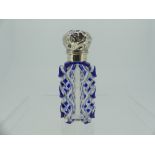 A 19th silver mounted blue flash glass Scent Bottle, the unmarked hinged lid with stopper, 7cm