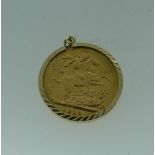A George V gold Sovereign, dated 1914, in 9ct gold pendant mount.