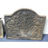 A Carolean-style cast iron Fireback, with shaped top and embossed with 'C R' , oak tree and crown