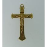 A 22ct yellow gold Crucifix Pendant, with integral suspension loop, unmarked but tested, approx