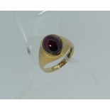 A 9ct yellow gold Gentleman's signet Ring, with centre set with a cabochon synthetic ruby, Size W½.