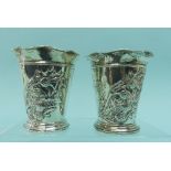 A pair of Edwardian silver Vases, by Henry Matthews, hallmarked Chester, 1905, in the form of