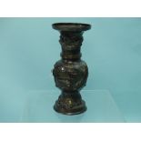 A Japanese Meji period bronze Vase, moulded in relief with a dragon, storks and tortoises, key